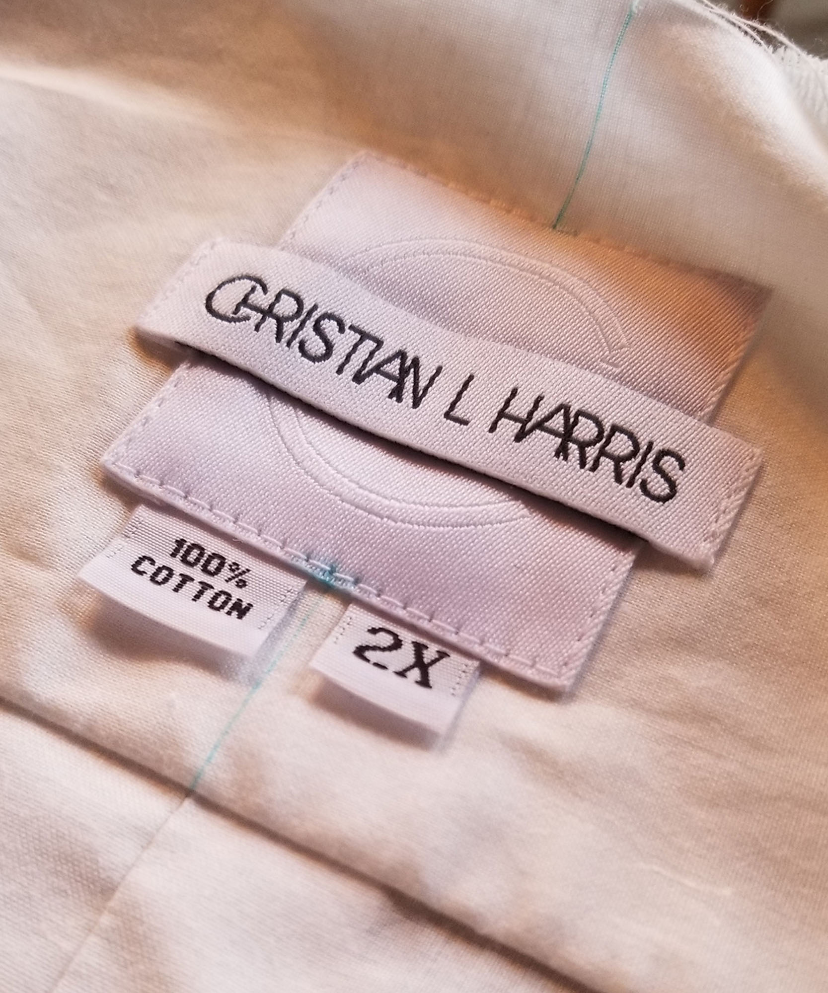 Christian L harris logo on tag inside white shirt