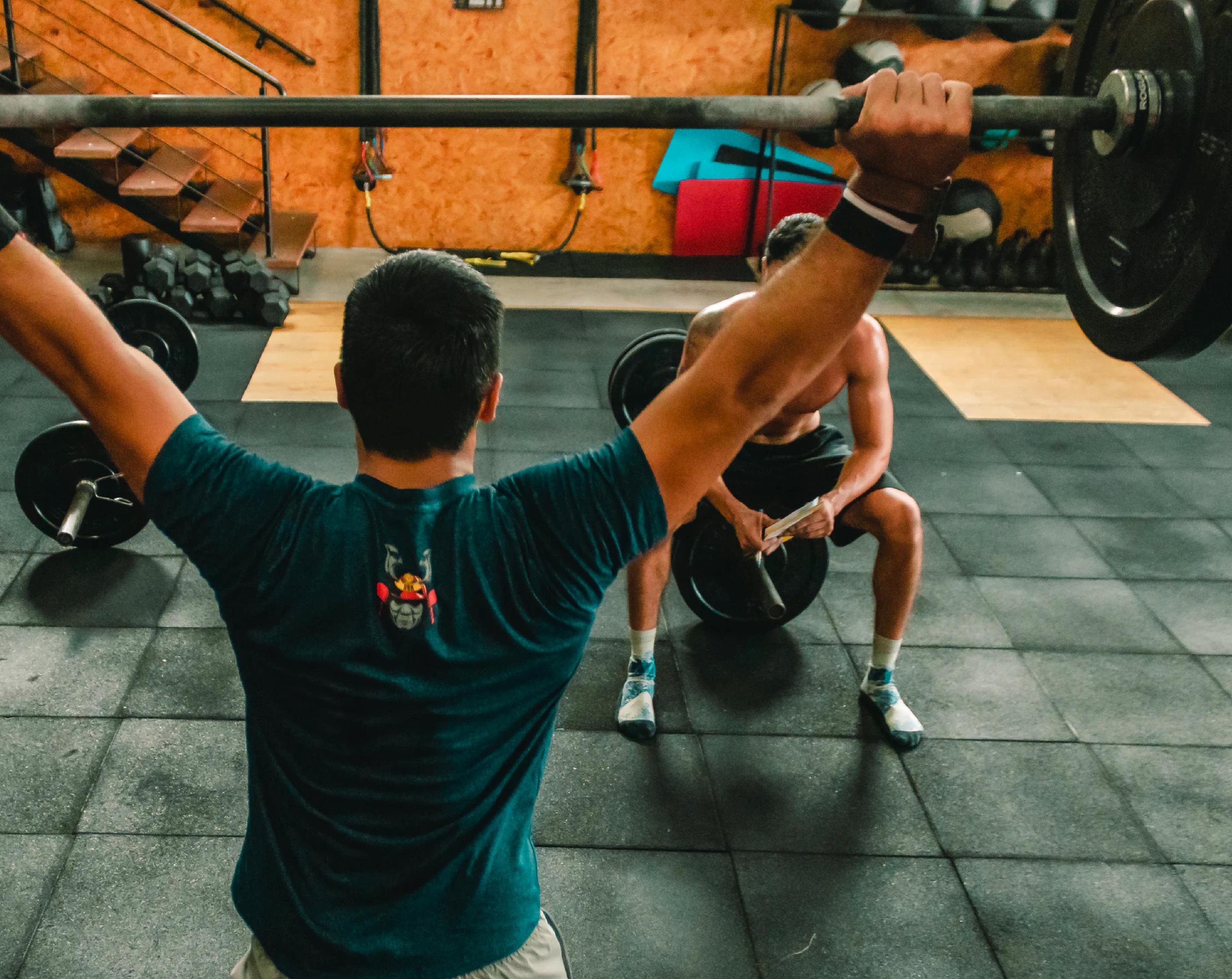 Person performing overhead press