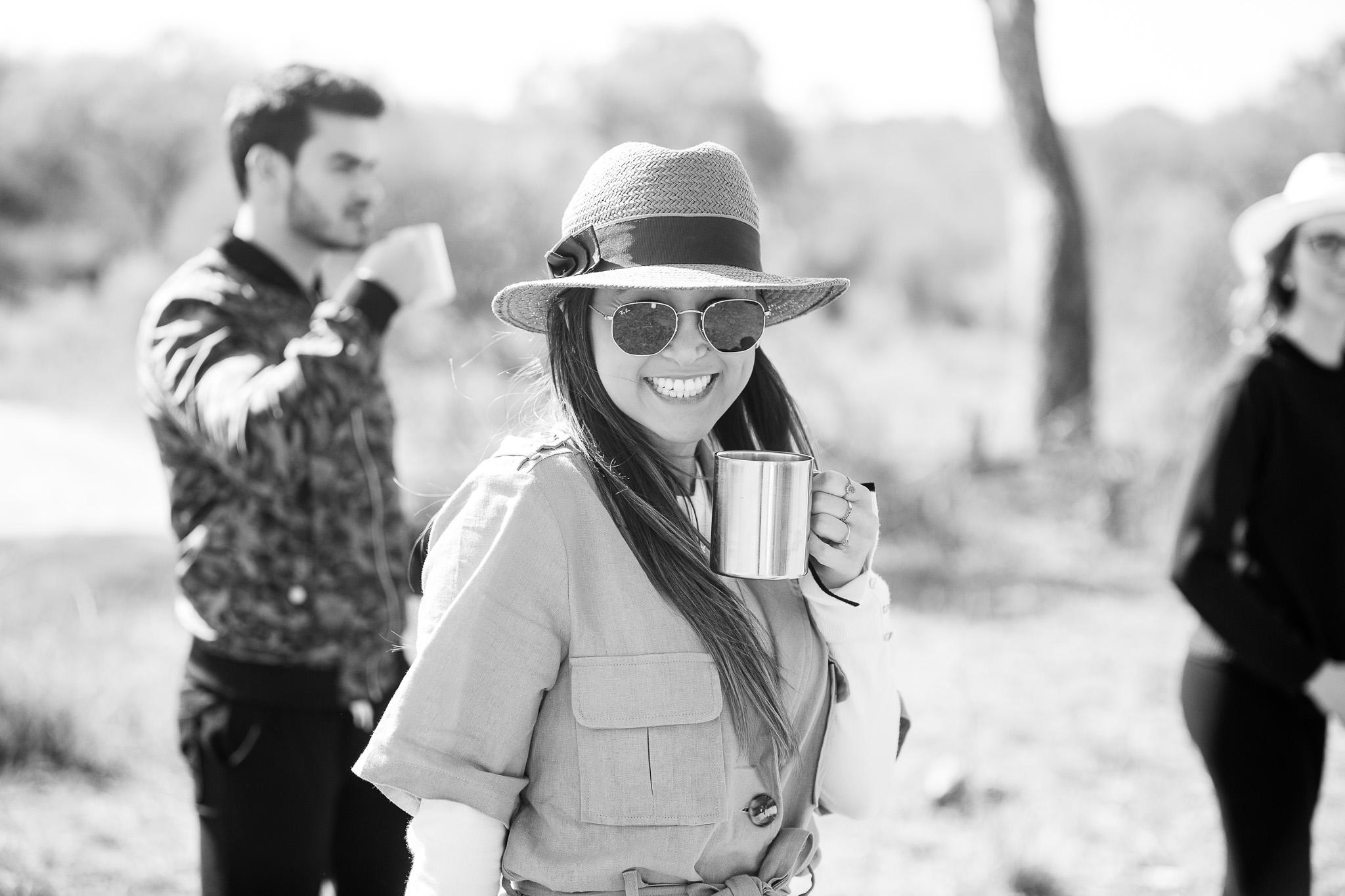 Louise Meyer Photography - woman on a safari holding a drink