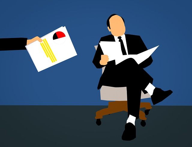 Insurance professional reviewing claims processing software