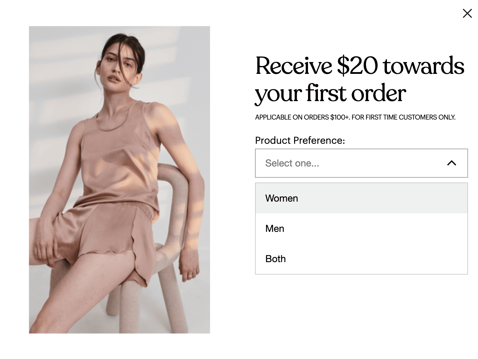 Popup showing a woman resting against a char, with following text: receive $20 towards your first order