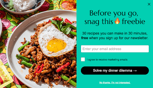Popup message featuring a photo of a plate of food alongside the text "Before you go, snag this freebie"