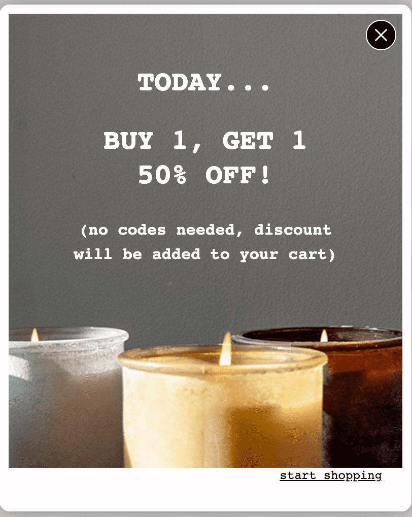 Popup featuring a photo of candles with the text today ... buy 1, get 1 50% off