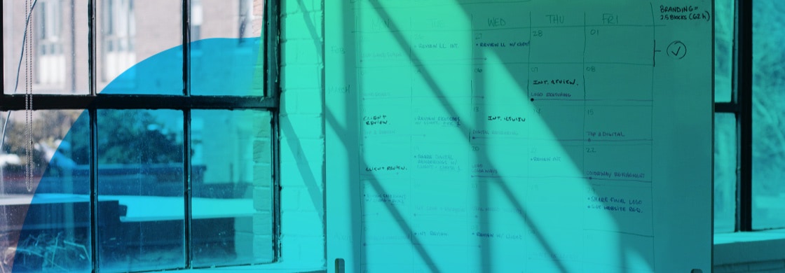 a whiteboard with calendar on it