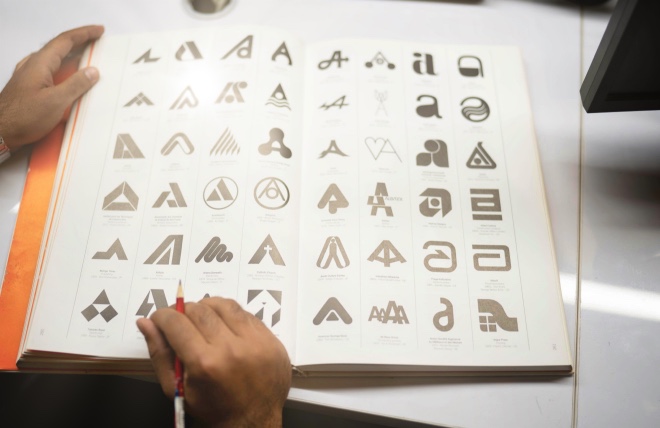 designer sketching on notebook