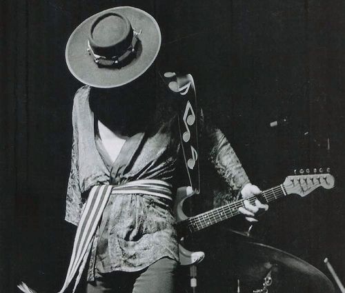 How to Put On a Guitar Strap