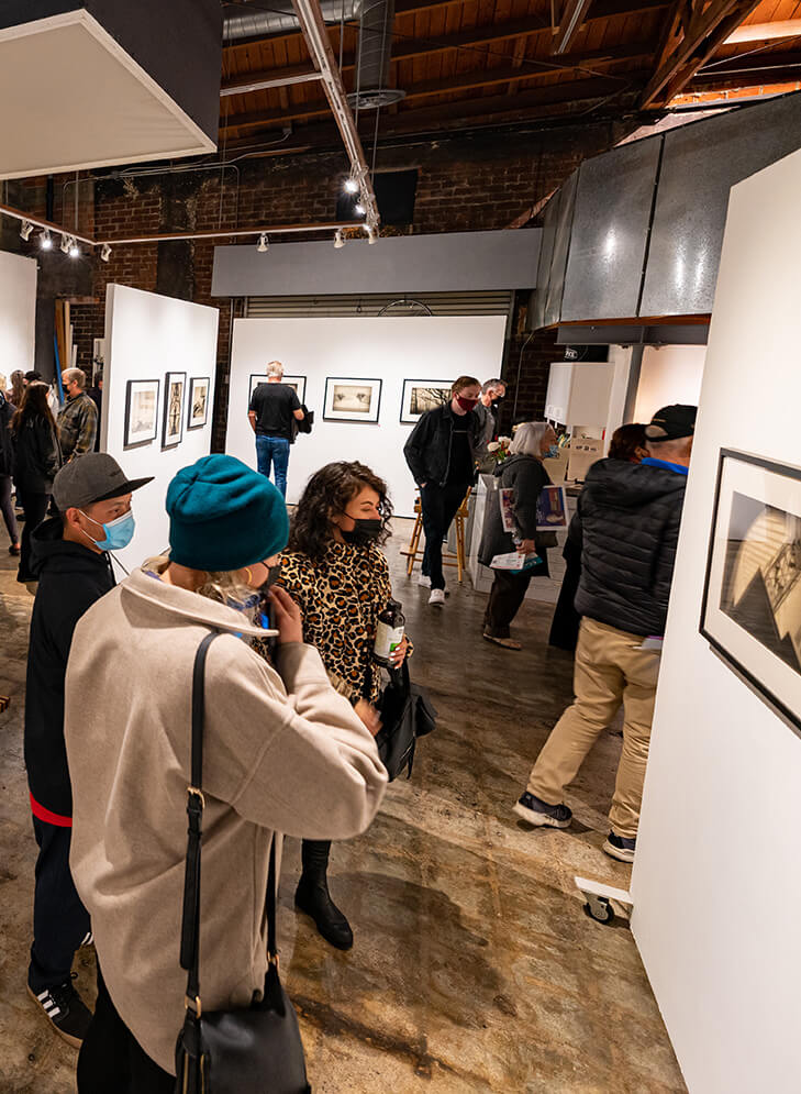 People browsing at an art gallery in Downtown San Pedro