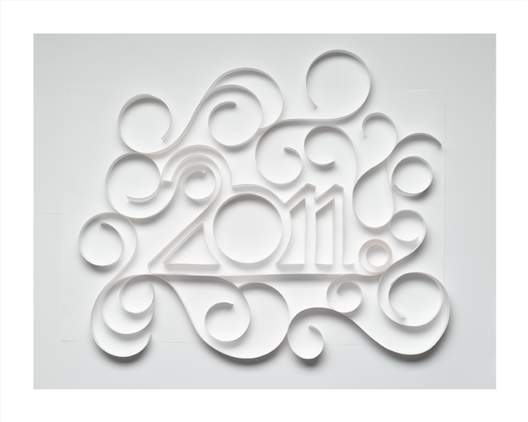 Curled paper strips that form the number 2011