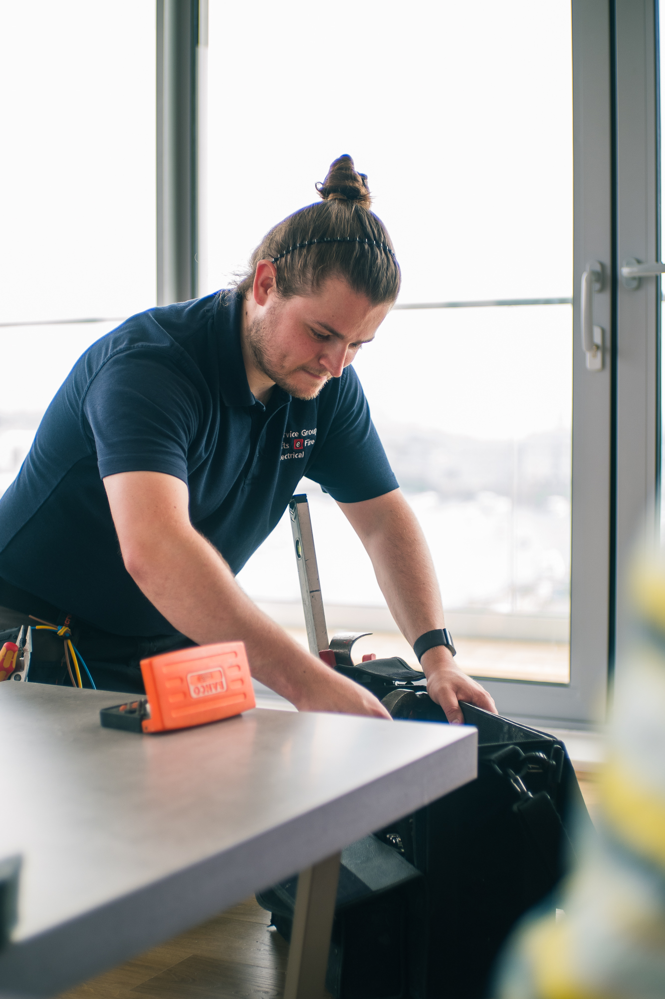 Electrician with tools