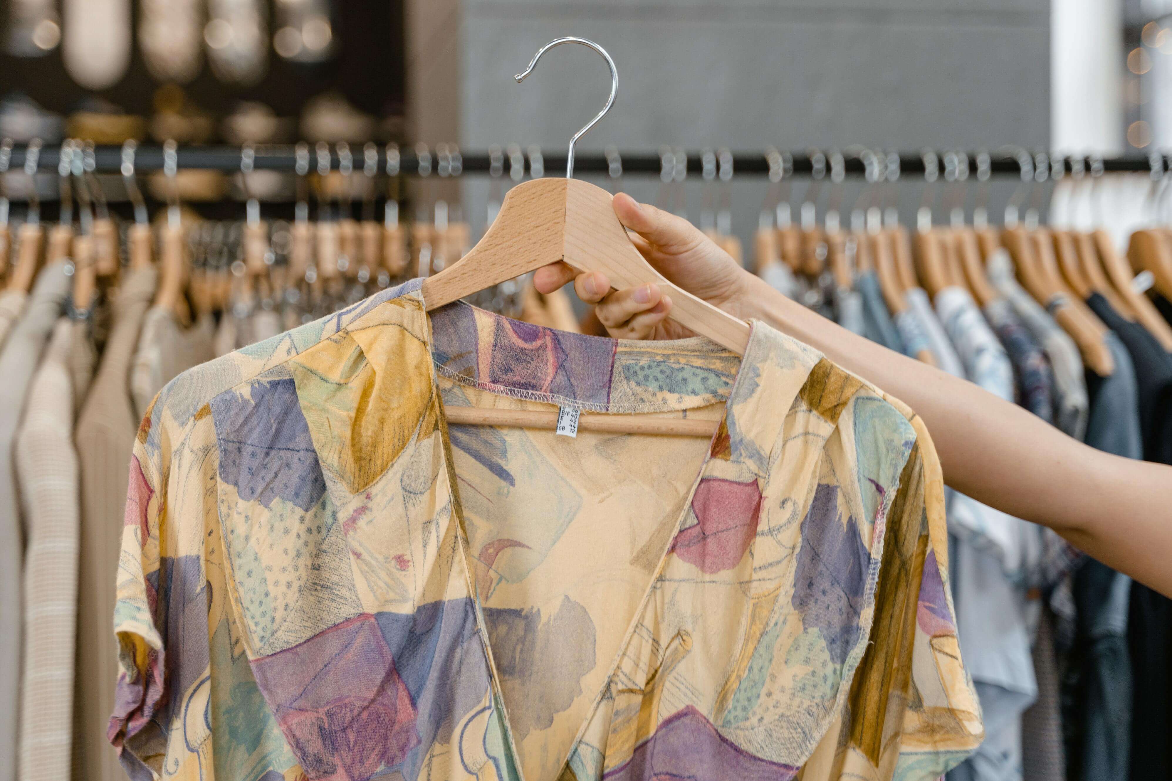 woman holding a shirt
