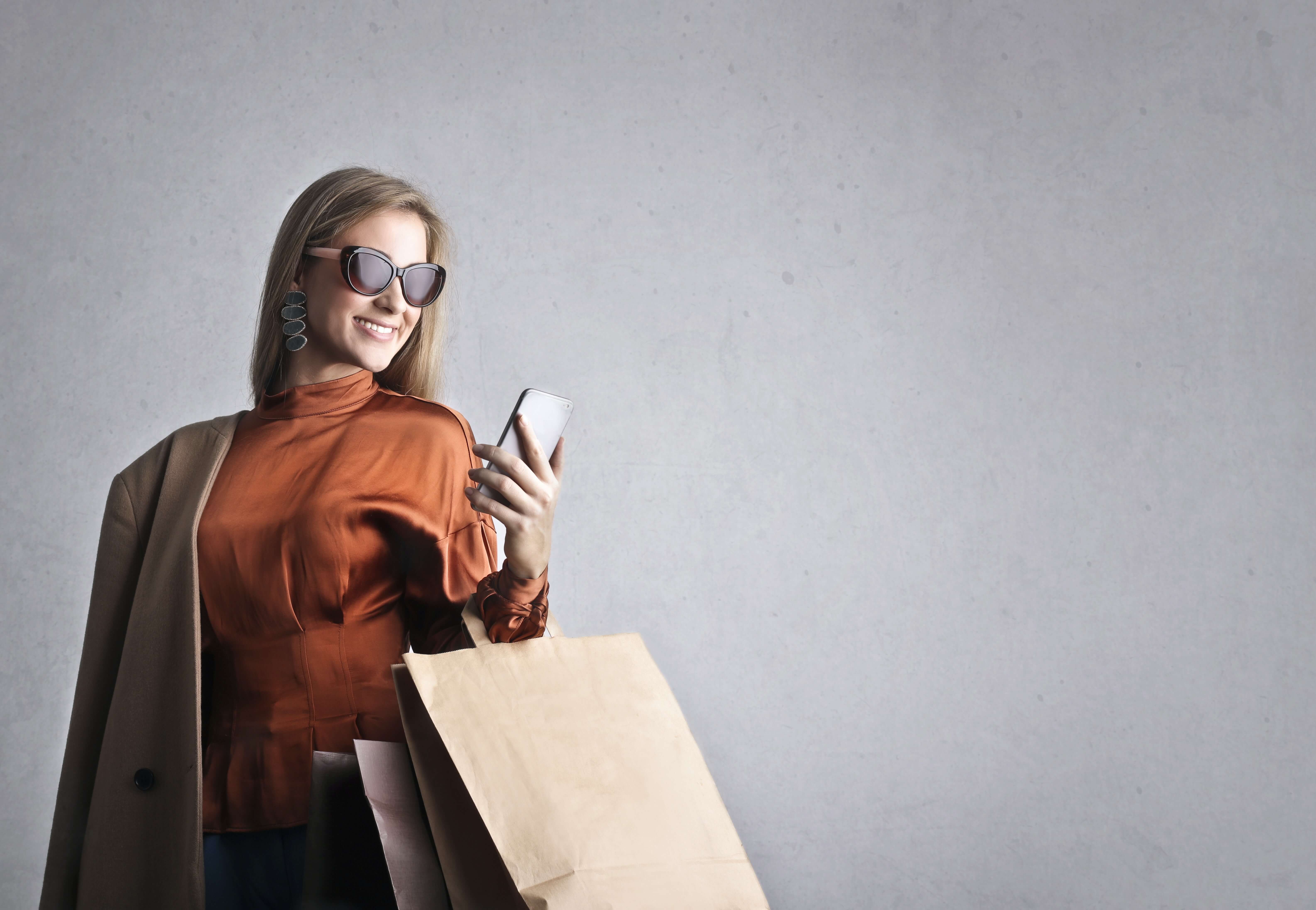 Woman with clothes sold through cross-listing software
