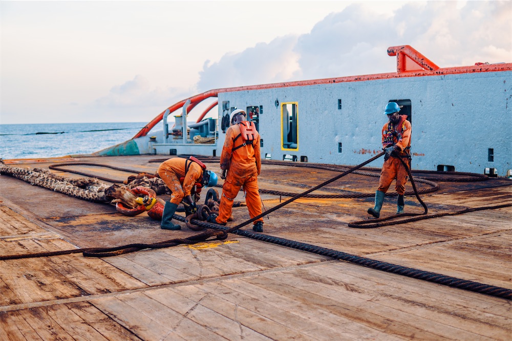 LATC Marine worker on docks performing routine checks