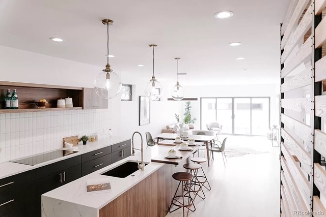 A remodeled and modern house with updated furniture and bright lighting