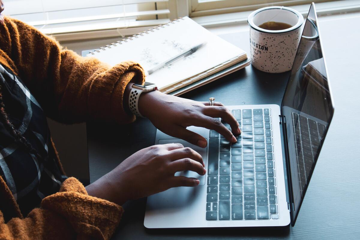 person-working-on-laptop-on-table