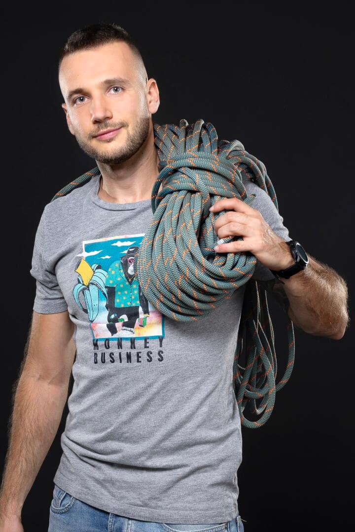 Photo of Miro holding his climbing rope