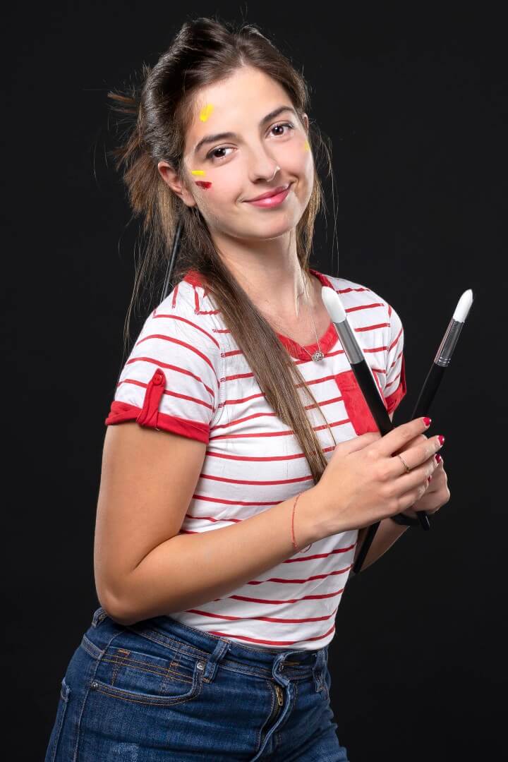 Photo of Gabriela showing her art skills