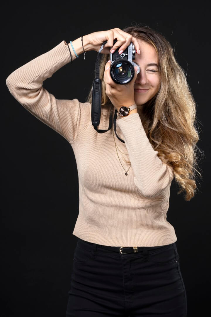 Photo of Tsveti holding her camera