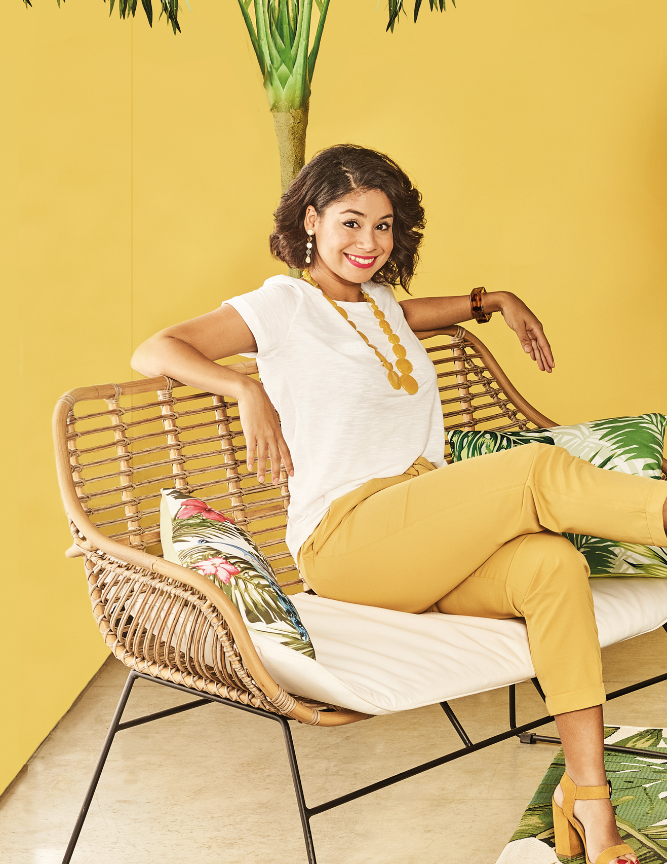 portrait of a young woman in yellow background