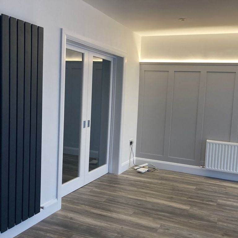 Image of panelling, wooden flooring and doors with glass panels