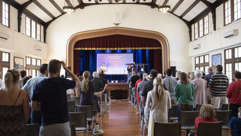 People standing up during a church service