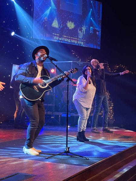 Singers performing on stage
