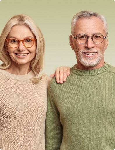 a smiling old couple