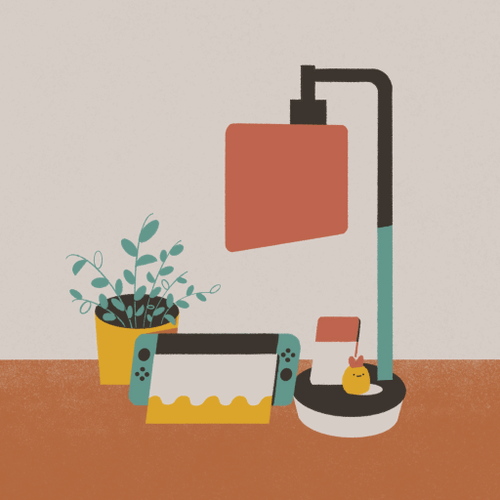 Little set up near my desk, with a lamp, Nintendo switch, and plant.