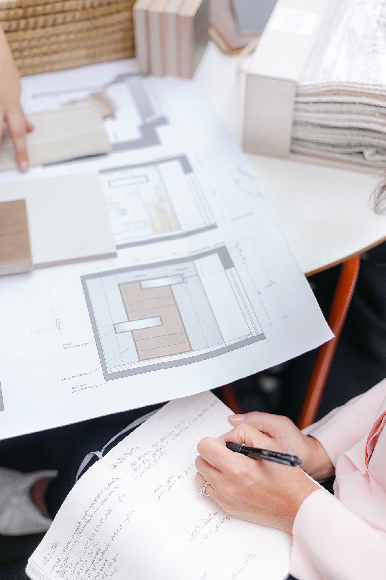 client meeting with technical drawings