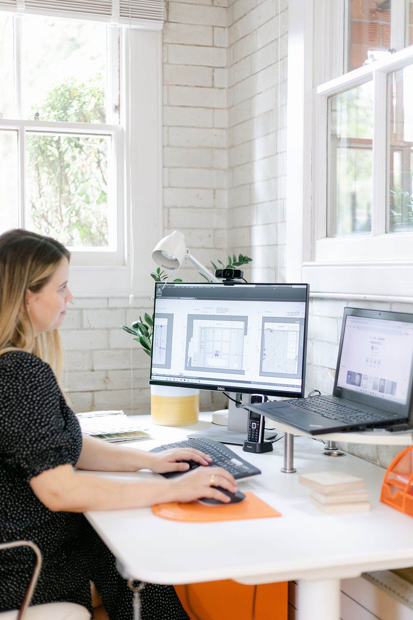 designer working on technical drawings