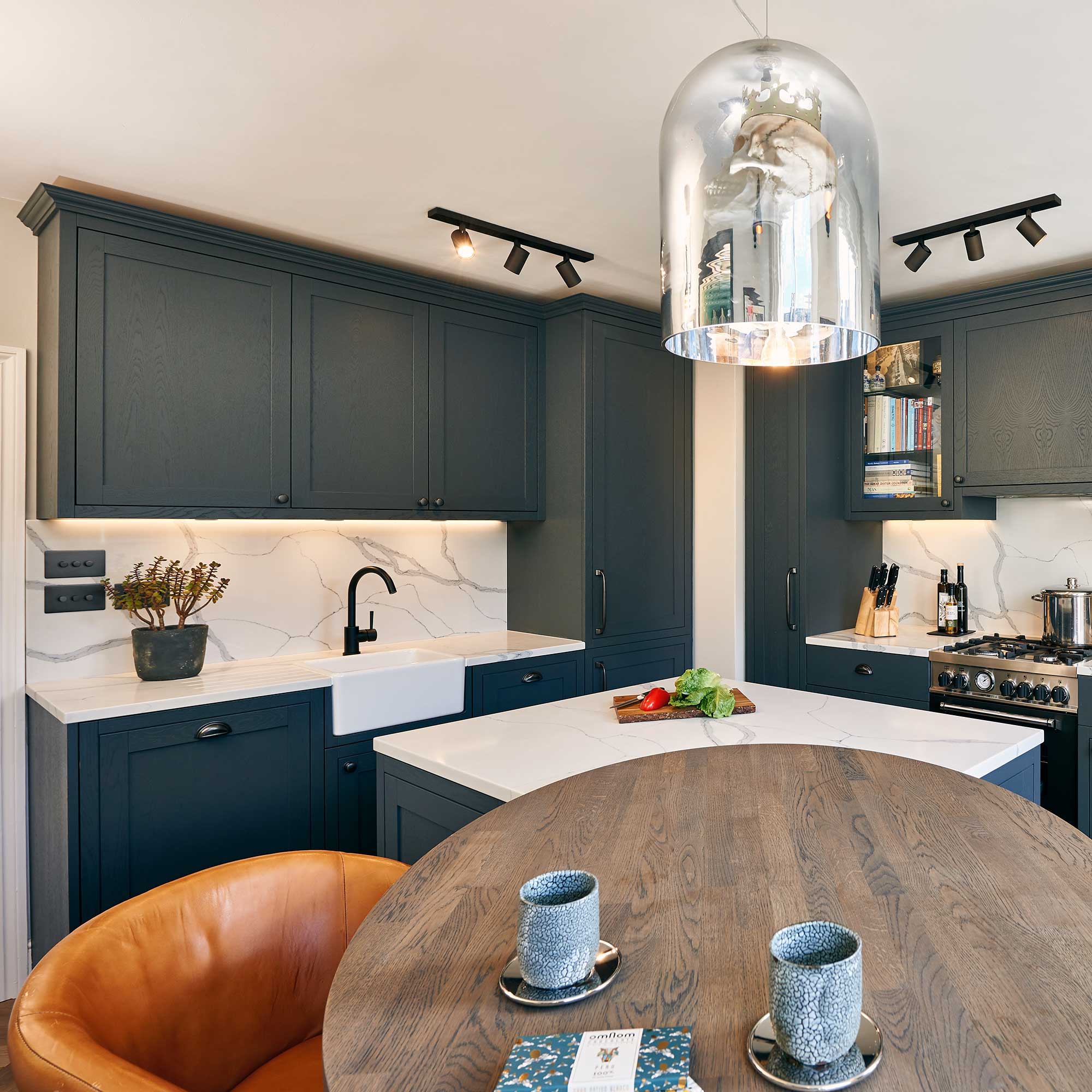 dark kitchen with leather stools