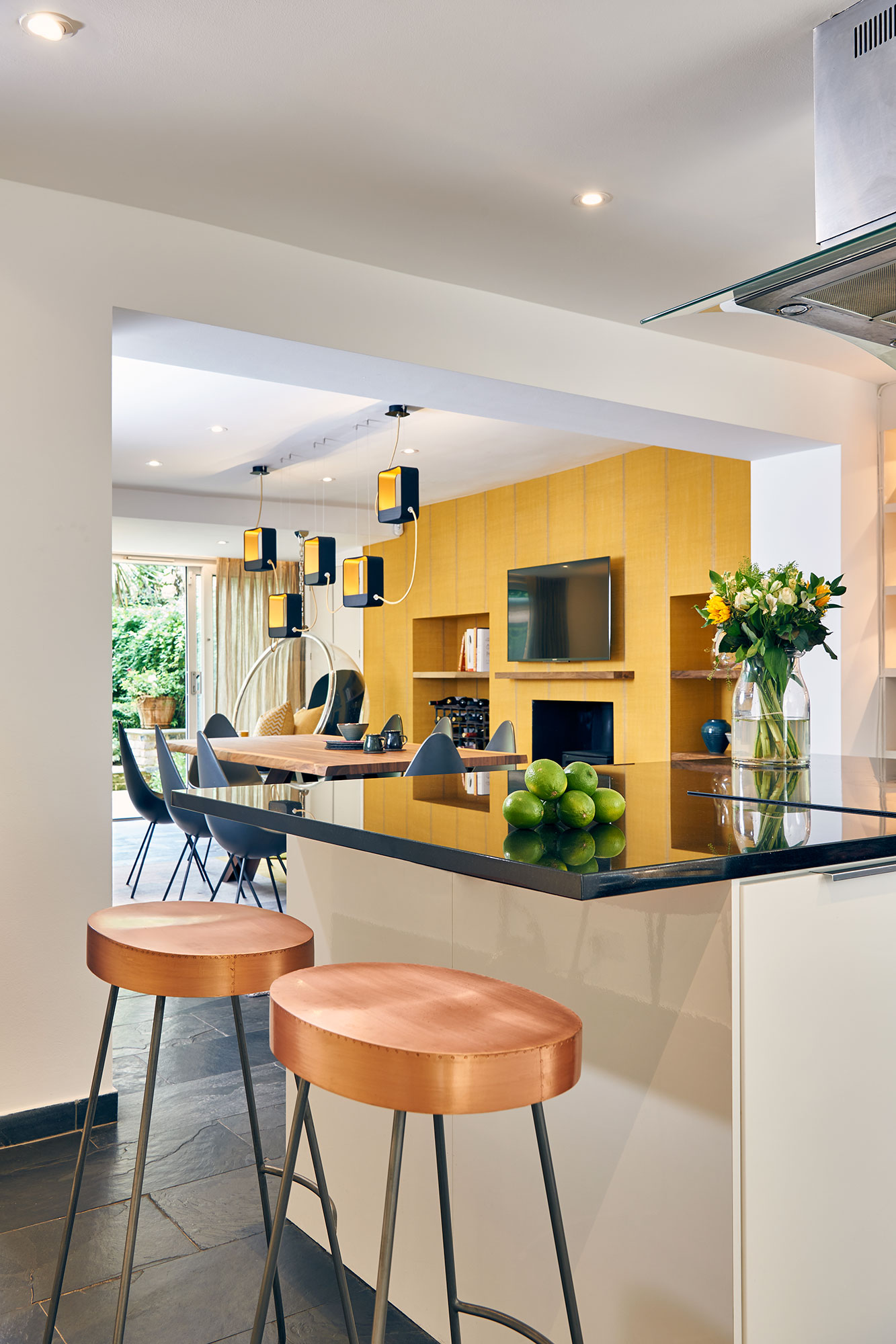 modern kitchen dining area with feature lighting
