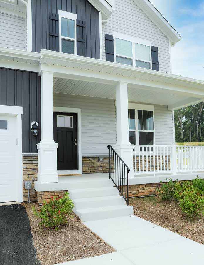 White house with vinyl siding.