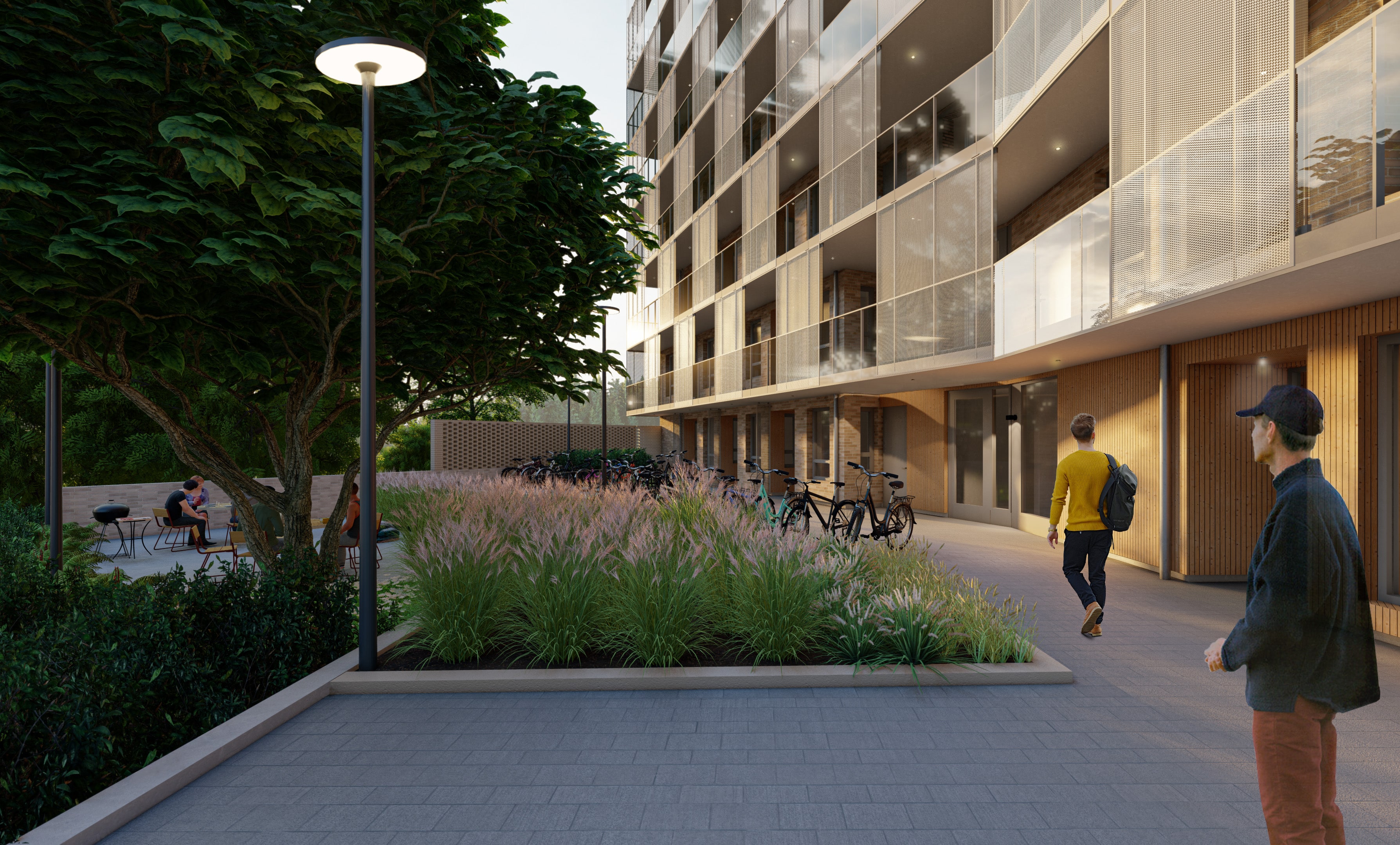 Visualisering: Innergård med plattsättning, planteringar, uteplats samt cykelparkering.
