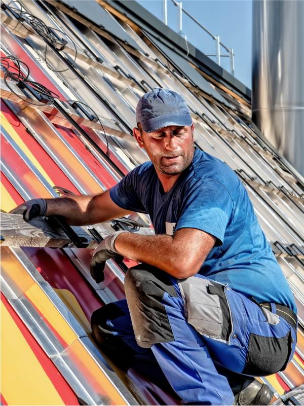 man working on roof