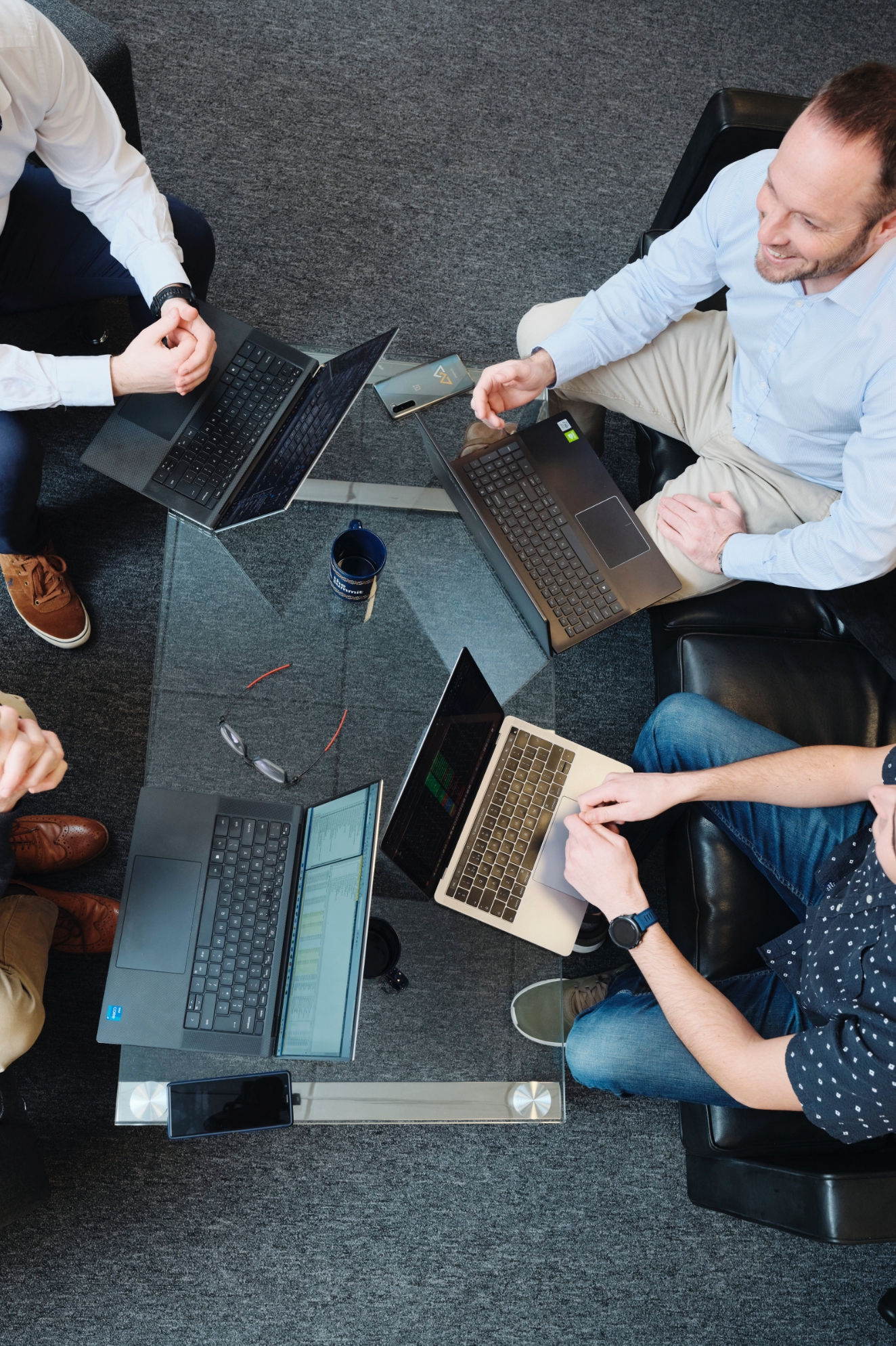 A top down shot of a team of people discussing