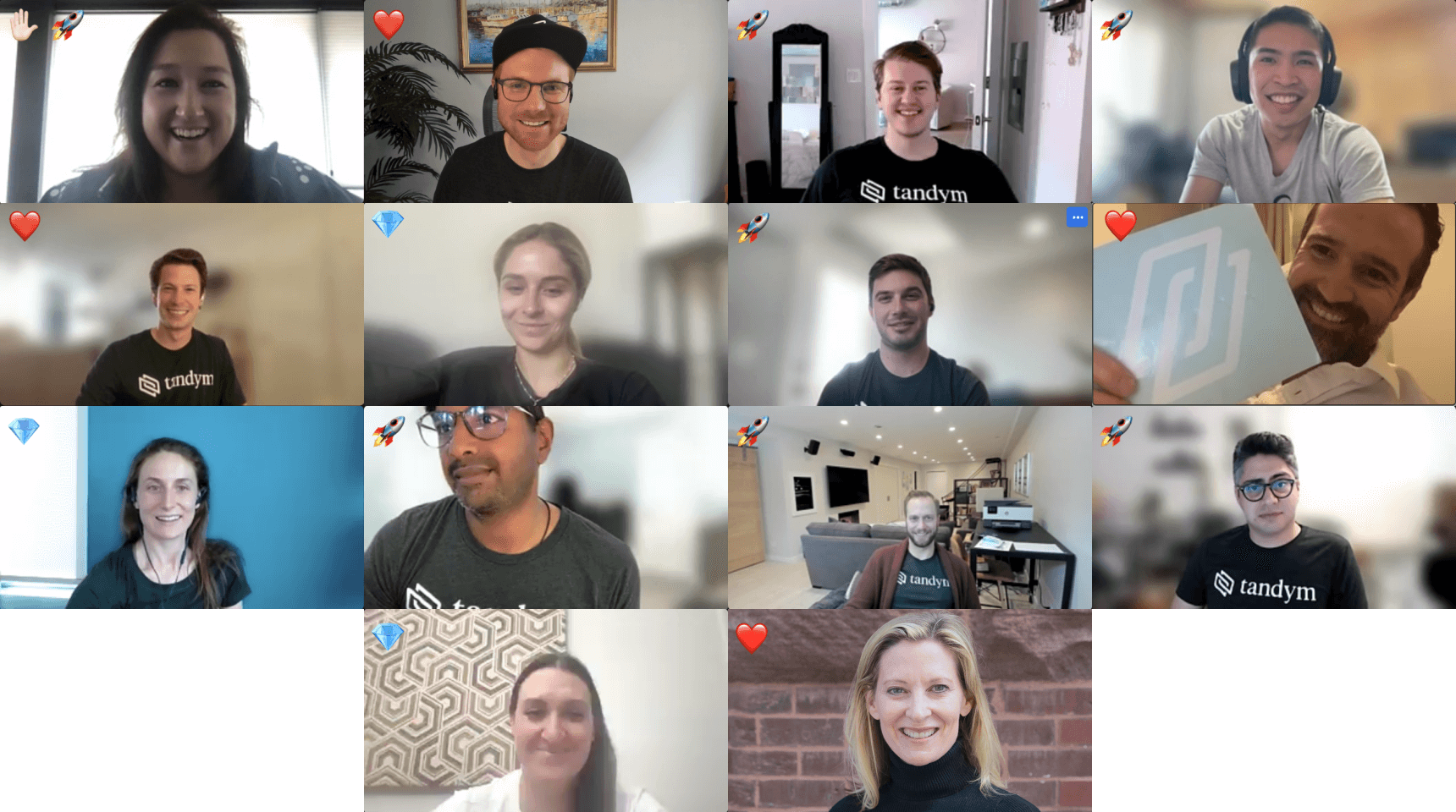 Screenshot of Tandym employees on a video call sharing reaction emojis of heart, rocket, and diamond.