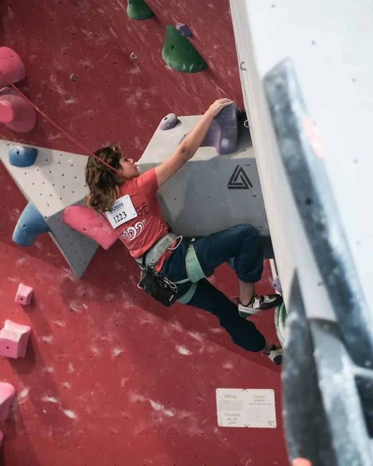 A young female rock climber.