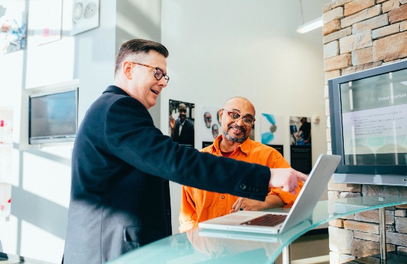 Two men working together in an office