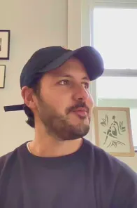 Profile picture of a man recording a vouch video