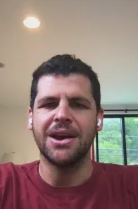 Profile picture of a man recording a vouch video
