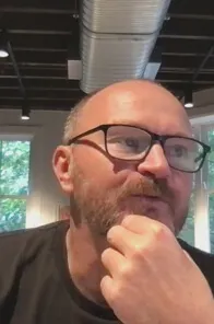 Profile picture of a man recording a vouch video