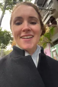 Profile picture of a woman recording a vouch video