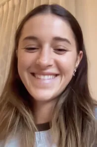 Profile picture of a woman recording a vouch video