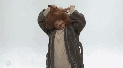 GIF of woman ripping hair out