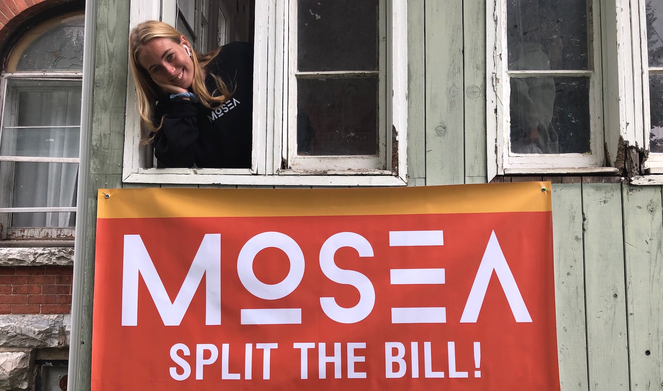 Mosea Flag hanging out of window