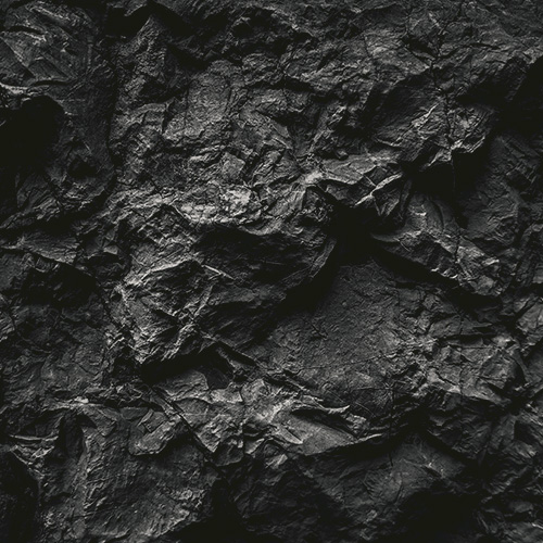 Black volcanic rock showing texture and hard edges for the fire elemental spa package
