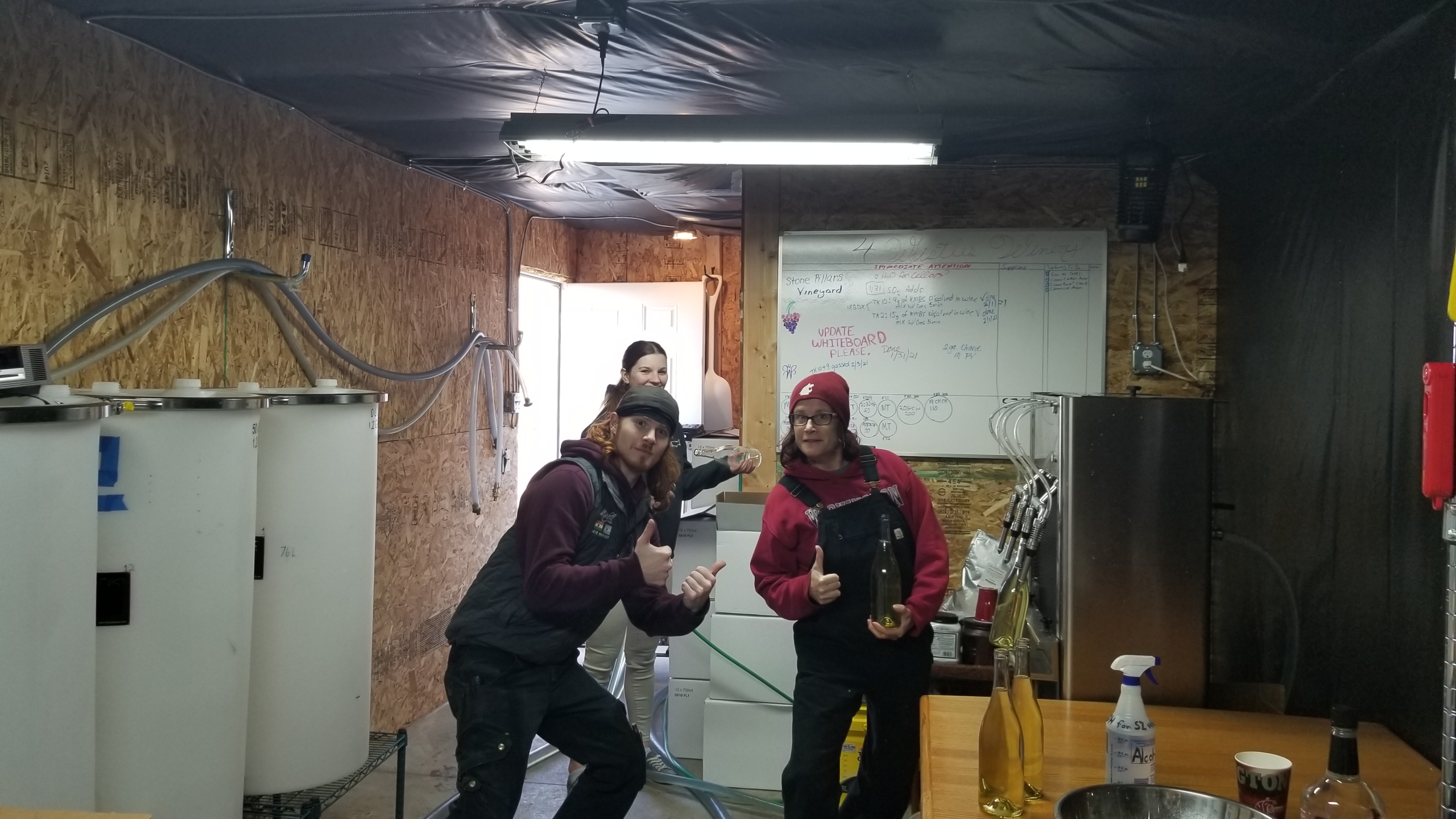 4 Whistles Winery crew giving a thumbs up