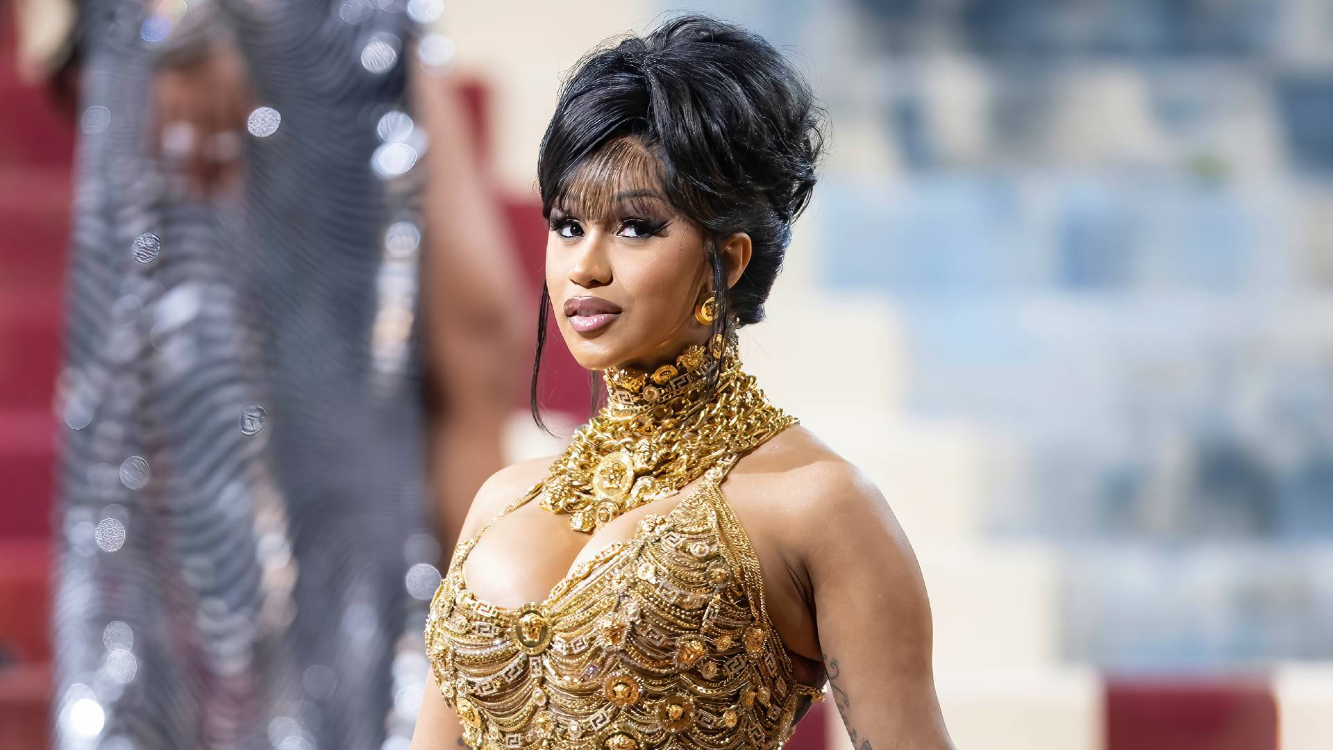 Cardi B Reveal Her New "Kids" Tattoo