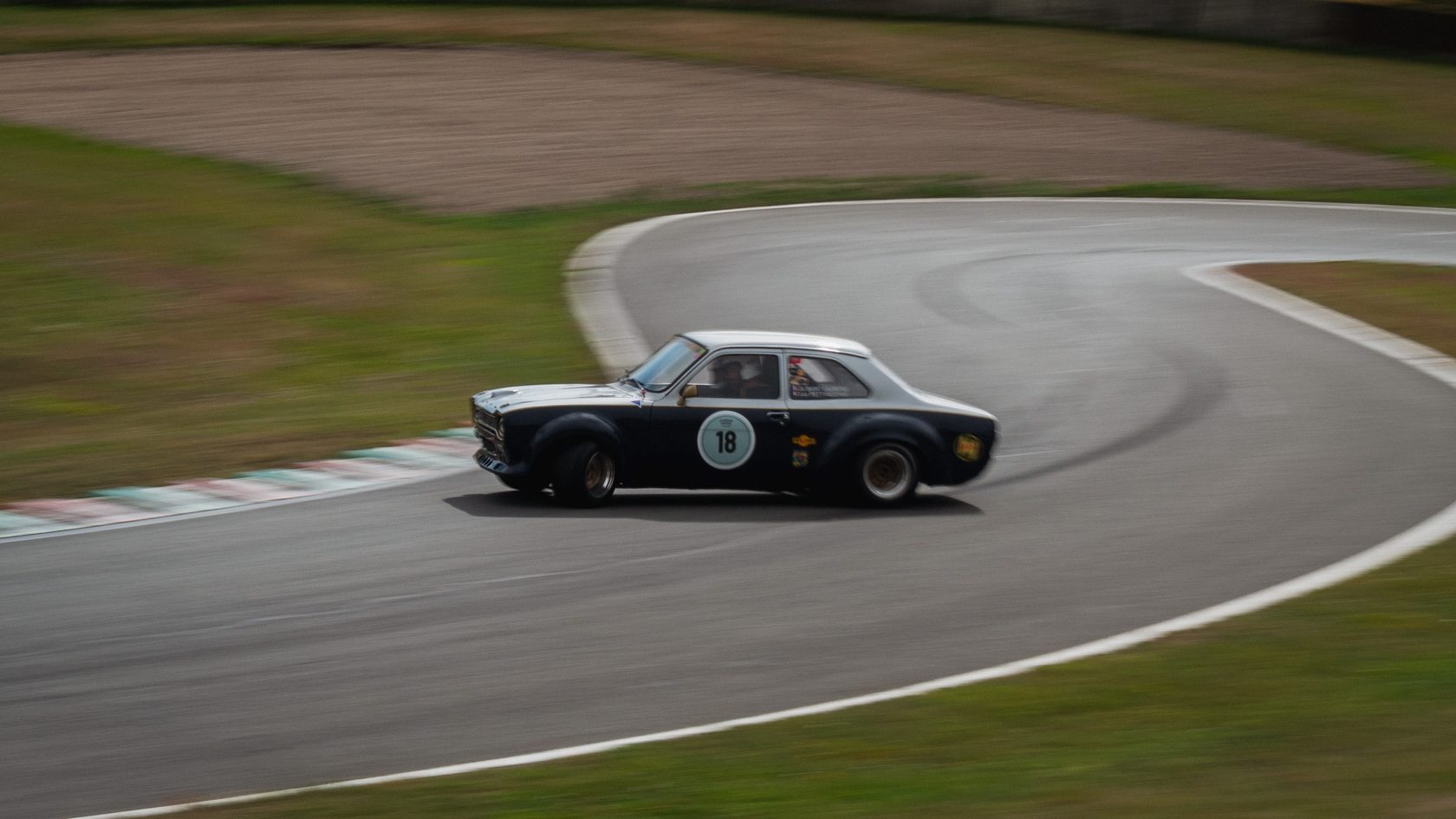 Image with a drifting car.
