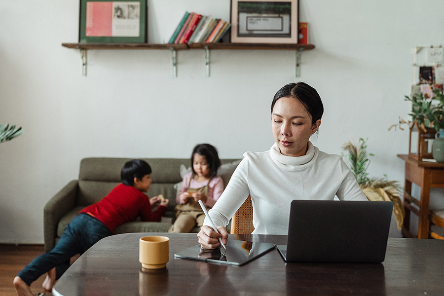 Home office with children playing on the background